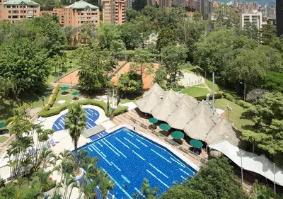 an overhead view of a swimming pool in a city at InterContinental Medellin - Movich by IHG in Medellín