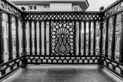 a black and white photo of a fence at Hotel Rio Piedras in Jericó