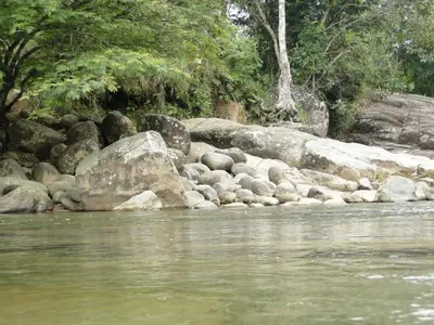 a group of rocks on the side of a river at Hotel La Casona - San Luis in San Luis