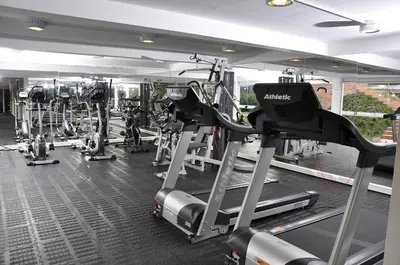a gym with several treadmills and cardio machines at Estelar Recinto Del Pensamiento Hotel Y Centro De Convenciones in Manizales