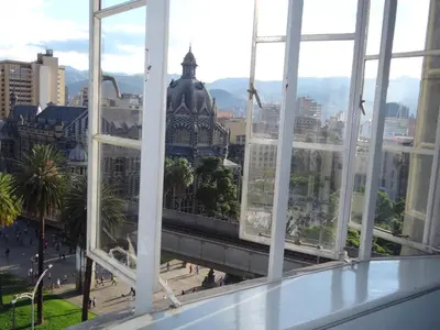 a view of a city from the window of a building at Hotel Nutibara in Medellín