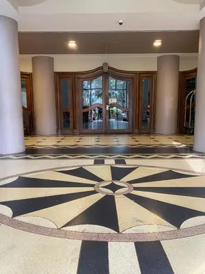 a lobby with a large room with a large floor at Hotel Nutibara in Medellín