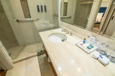 a bathroom with a sink and a shower at Four Points by Sheraton Medellín in Medellín