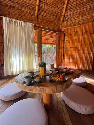 a room with a table with food on it at Hotel Campestre la Playa in Betania
