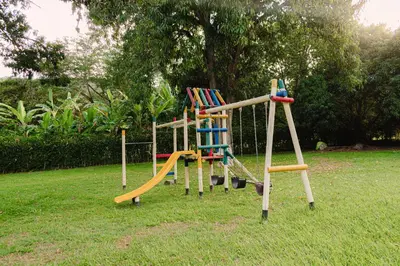 a set of playground equipment in a park at Hotel San Sebastian del Tonusco in Santa Fe de Antioquia