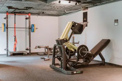 a gym with two treadmills and a treadmill at Hotel Park10 in Medellín