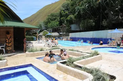 a group of people in a swimming pool at Rio Escondido in San Jerónimo