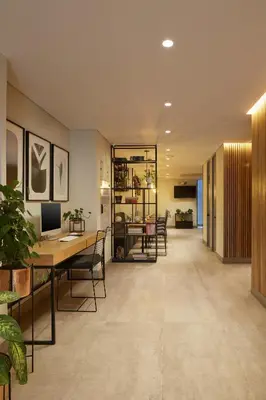 an office with a long hallway with a desk and chairs at 14 Urban Hotel in Medellín