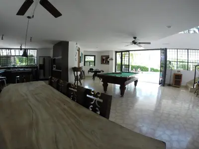a large living room with a pool table in it at Finca Galicia in Sopetran