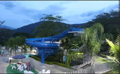 a slide at a resort with a water park at Apartamento en Condominio in San Jerónimo