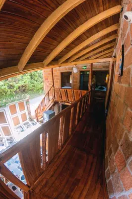 an overhead view of a porch with a wooden deck at Hostal Vista Hermosa in San Rafael