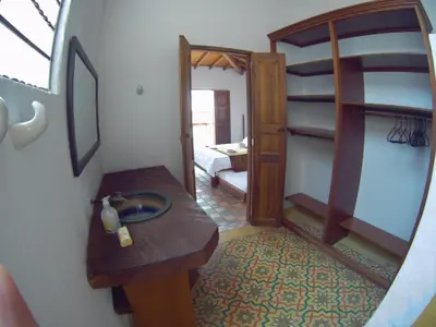 a bathroom with a sink and a mirror at Casa Republicana en Jericó in Jericó