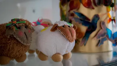 a group of stuffed animals sitting on a table at Hotel Portal de Milán in Manizales