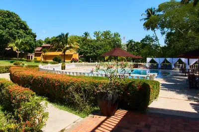 a resort with a swimming pool and a resort at La Iguana de Santa Fe by Bernalo Hotels in Santa Fe de Antioquia