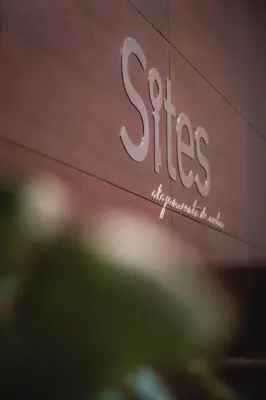 a sign for a store of sitzes supermarket ash at Sites Hotel in Medellín