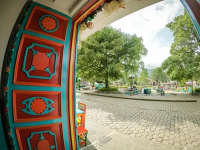 a door in a building with a playground in the background at Jardín by Bernalo Hotels in Jardin