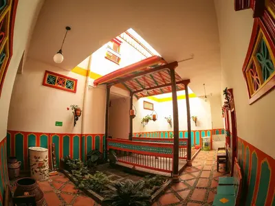 an inside view of a building with a colorful hallway at Jardín by Bernalo Hotels in Jardin