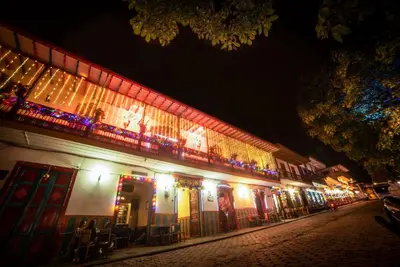 a building lit up at night with lights on it at Jardín by Bernalo Hotels in Jardin