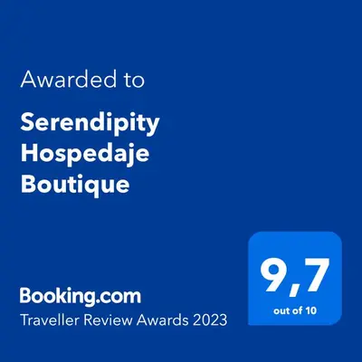 a blue phone screen with at Serendipity Hospedaje Boutique in Guatapé