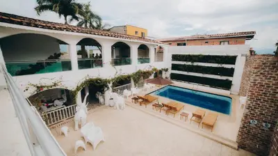 an aerial view of a house with a swimming pool at Ángel de Santa Fe by Bernalo Hotels in Santa Fe de Antioquia