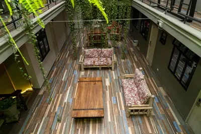 an overhead view of chairs and tables in a building at Hotel El Meson in La Dorada