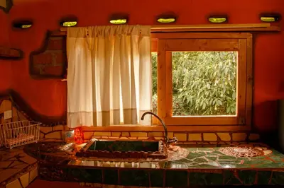 a kitchen with a sink and a window at Hospedaje Solentiname in Medellín