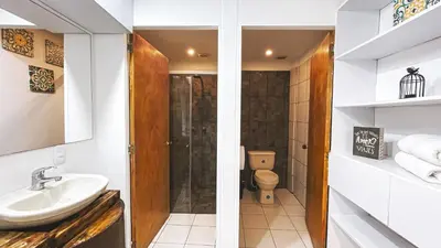 two images of a bathroom with a sink and a toilet at ADN Algo de Nosotros - Malaika in Medellín