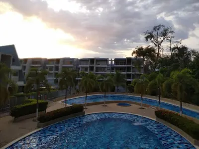 a large swimming pool in front of a building at Condominio Terrazas del Sol in Sopetran