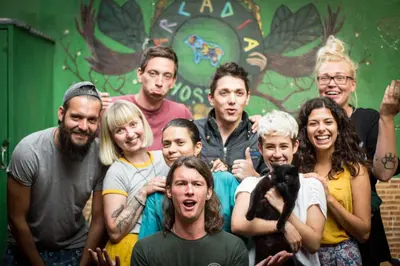 a group of people posing for a picture at Arcadia Hostel Medellin in Medellín