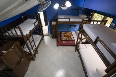 an overhead view of a room with several bunk beds at Arcadia Hostel Medellin in Medellín