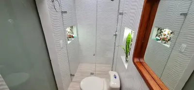 a bathroom with a shower with a toilet and a sink at Studio cerca a estacion metro poblado in Medellín