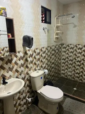 a bathroom with a toilet and a sink at Apartamento Ángel Namaste in Bello