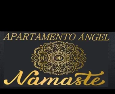 a sign that saysanna angel namaste with a gold logo at Apartamento Ángel Namaste in Bello