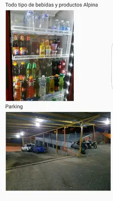 a refrigerator filled with lots of bottles of soda at Hotel La Posada in Belén de Umbría