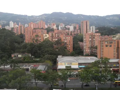 a view of a city with tall buildings and trees at Rent Apartment Furnished an alcove in Medellín