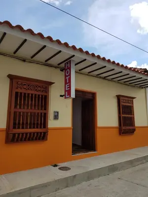 a building with a sign on the side of it at Hotel La Ceiba in Valparaíso