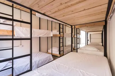 a room with four bunk beds in it at Gastón Coliving in Medellín