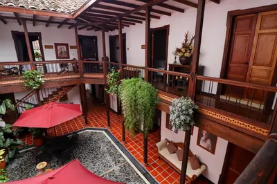an overhead view of a building with a balcony at Casa Lola Hotel Boutique in Salamina