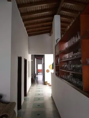 a hallway of a house with a long corridor at Big House Medellin in Medellín