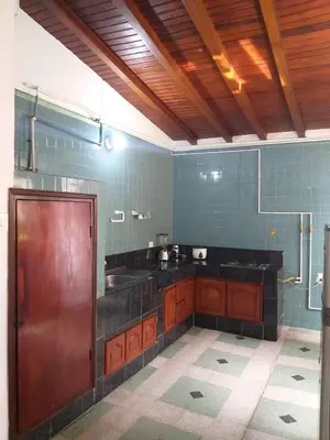 a bathroom with a sink and a counter top at Big House Medellin in Medellín