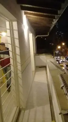 a view of the side of a building at night at Apartamento remodelado en el mejor sitio del centro de Medellín Home Aris 401 in Medellín