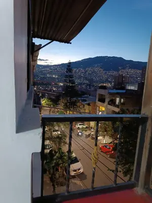 a view from a window of a city street at CAMPO VALDES PARK HOSTEL in Medellín