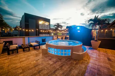 a hot tub on the roof of a building at Tik by Bernalo Hotels in Medellín
