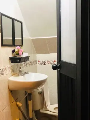a bathroom with a sink and a toilet at Casa Egos Pop Laureles in Medellín