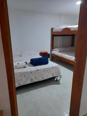 a bedroom with two bunk beds in a room at Villa del Socorro in Jardin