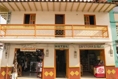 a store with a balcony on top of a building at Hotel Felicina in Jericó