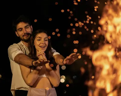 a man and a woman standing next to each other at Domus Glamping Guatapé in Guatapé