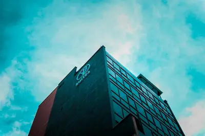 a building with a sign on the side of it at VPV Suites in Medellín