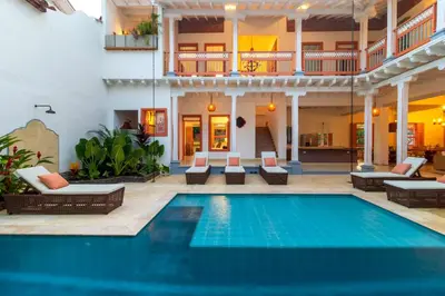 a swimming pool in the middle of a villa at Hotel Boutique Fundadores en Cauca Viejo in Jericó