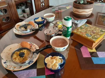 a table topped with plates of food on a table at Casa Patrimonial Abejorral - CASA GASAMA in Abejorral